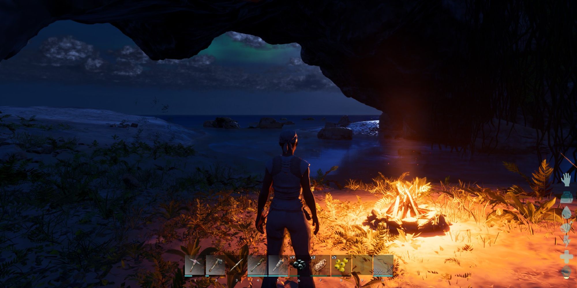 ark survival ascended player debout devant un feu de camp pendant la nuit